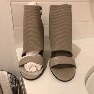 Brand new, never worn Vince open toe booties.